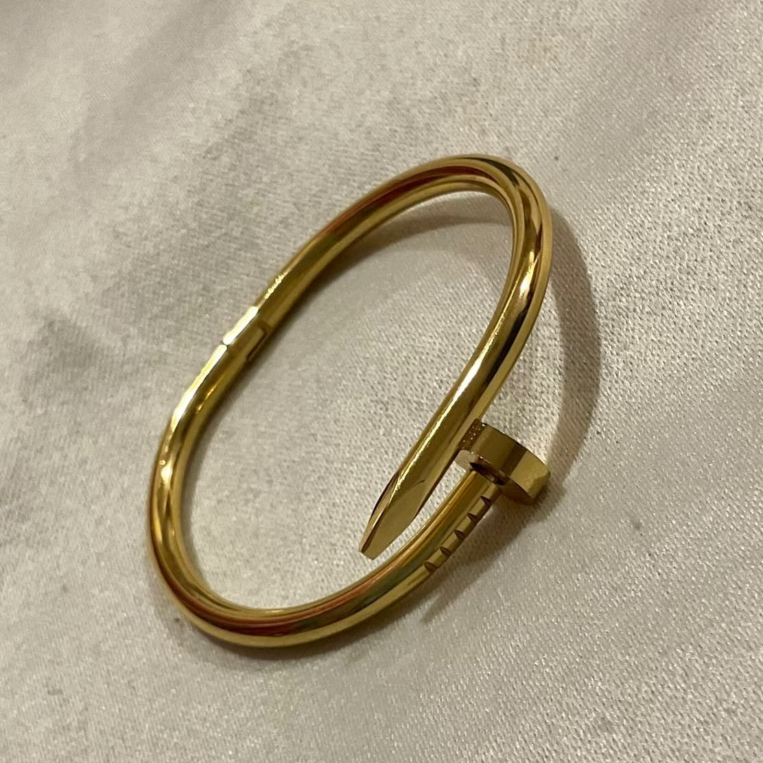 Nail bangle bracelet